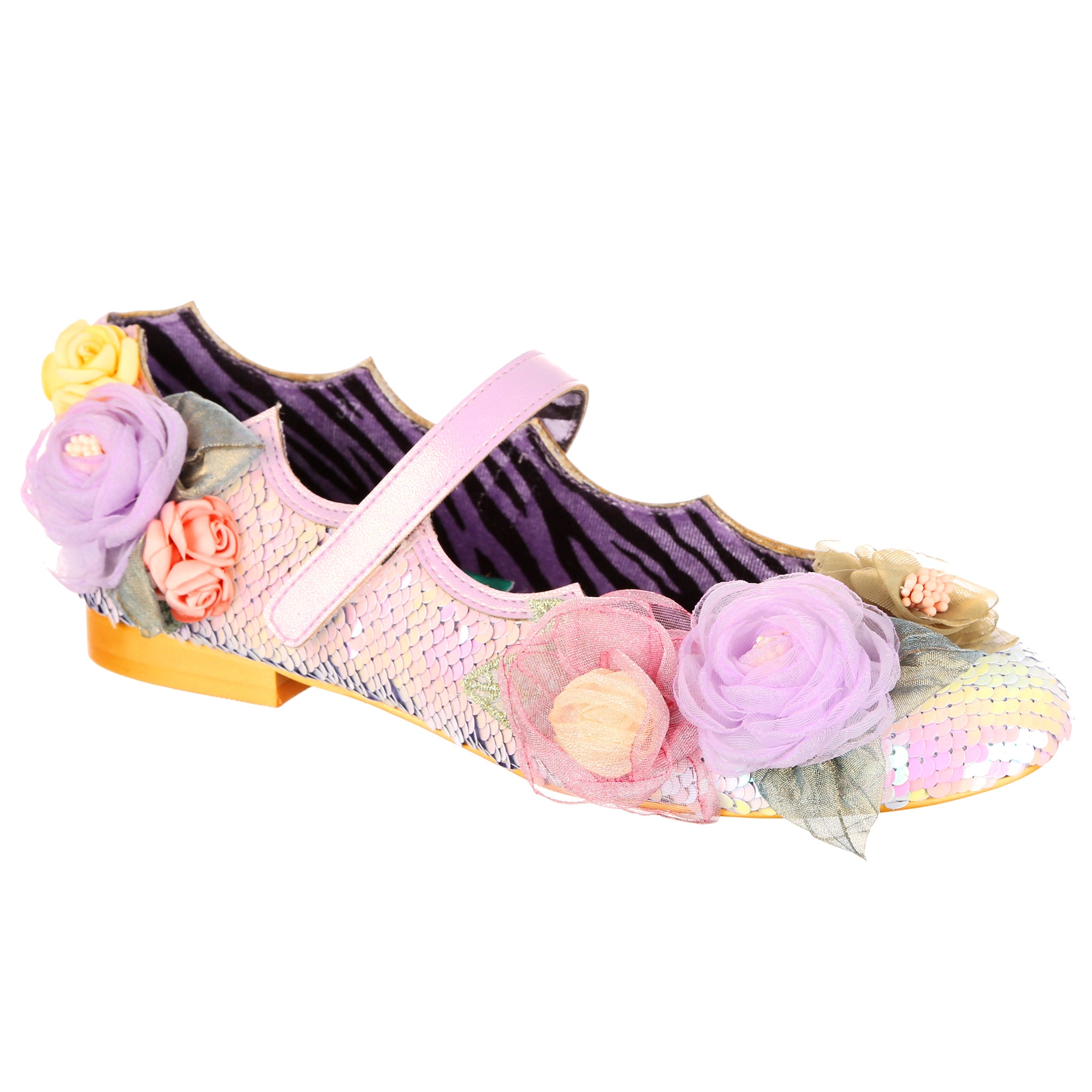 Pink sequin ballet pump shoe with 3D floral decorations and a mary jane strap on a white background.