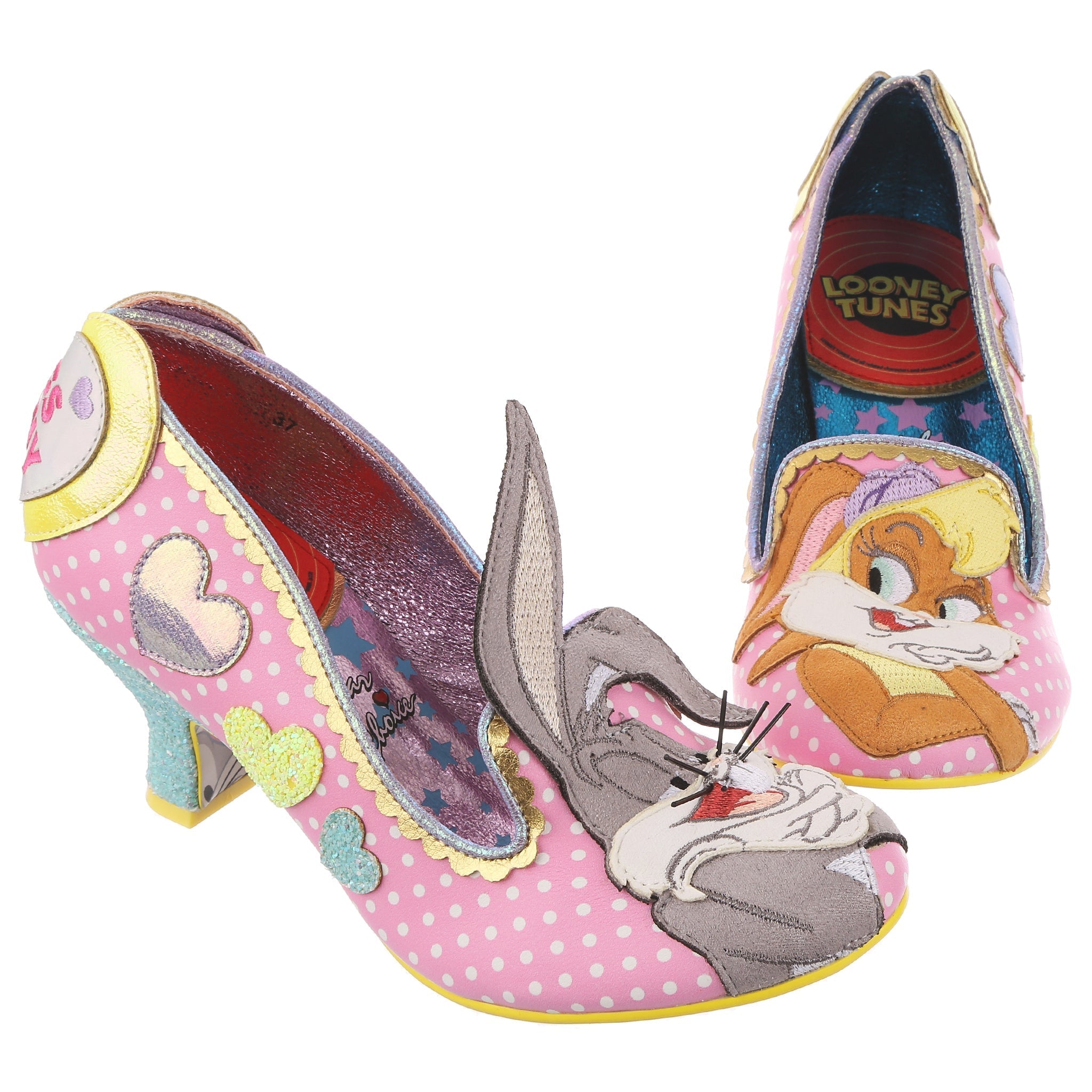 A pink and white polka dot with pastel glitter hearts, gold scalloping and Bugs Bunny appliqued on the right toe and Lola Bunny on the left toe. At the heel are hearts embroidered with their names inside, and a light blue glitter mid heel.