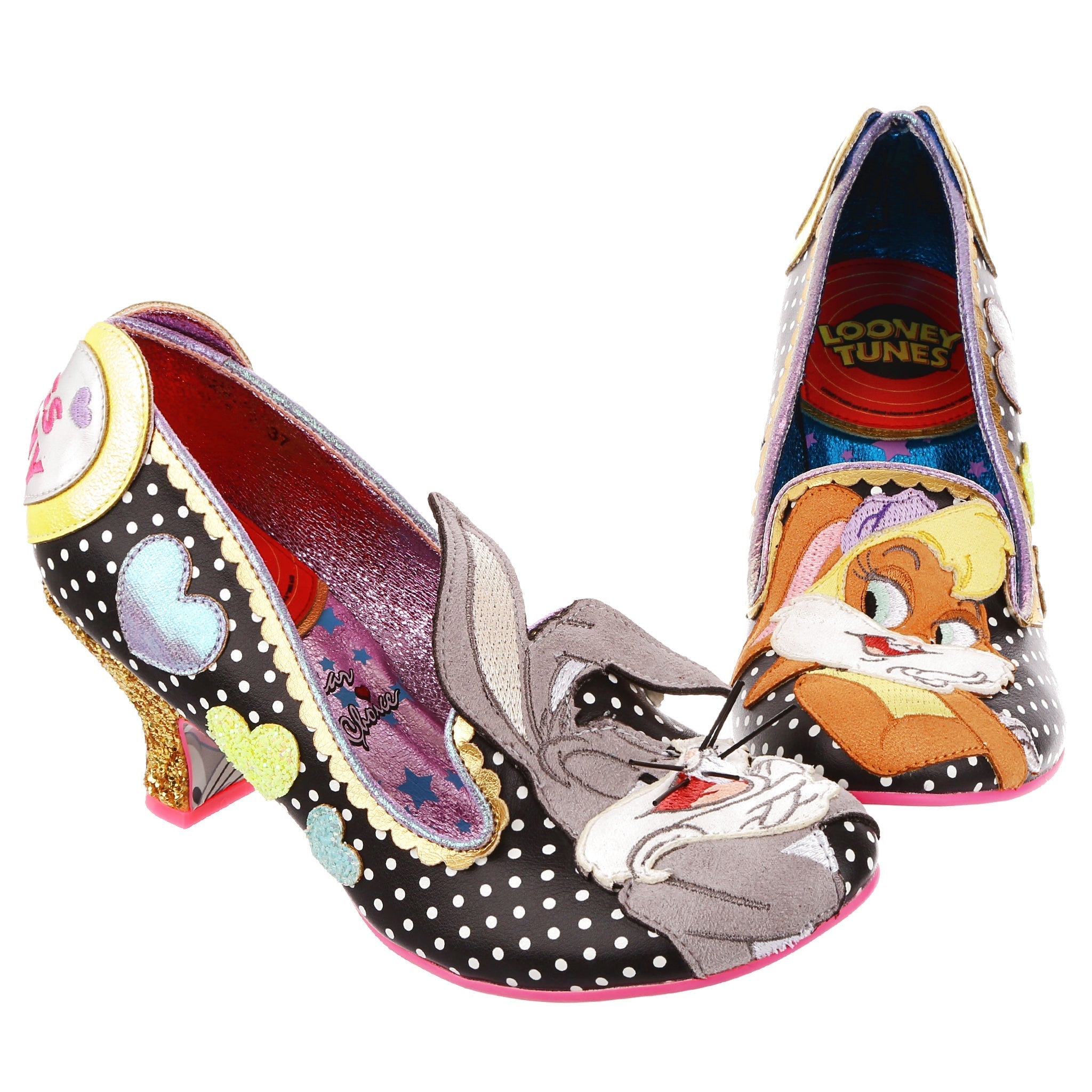 A black and white polka dot with pastel glitter hearts, gold scalloping and Bugs Bunny appliqued on the right toe and Lola Bunny on the left toe. At the heel are hearts embroidered with their names inside, and a gold glitter mid heel.