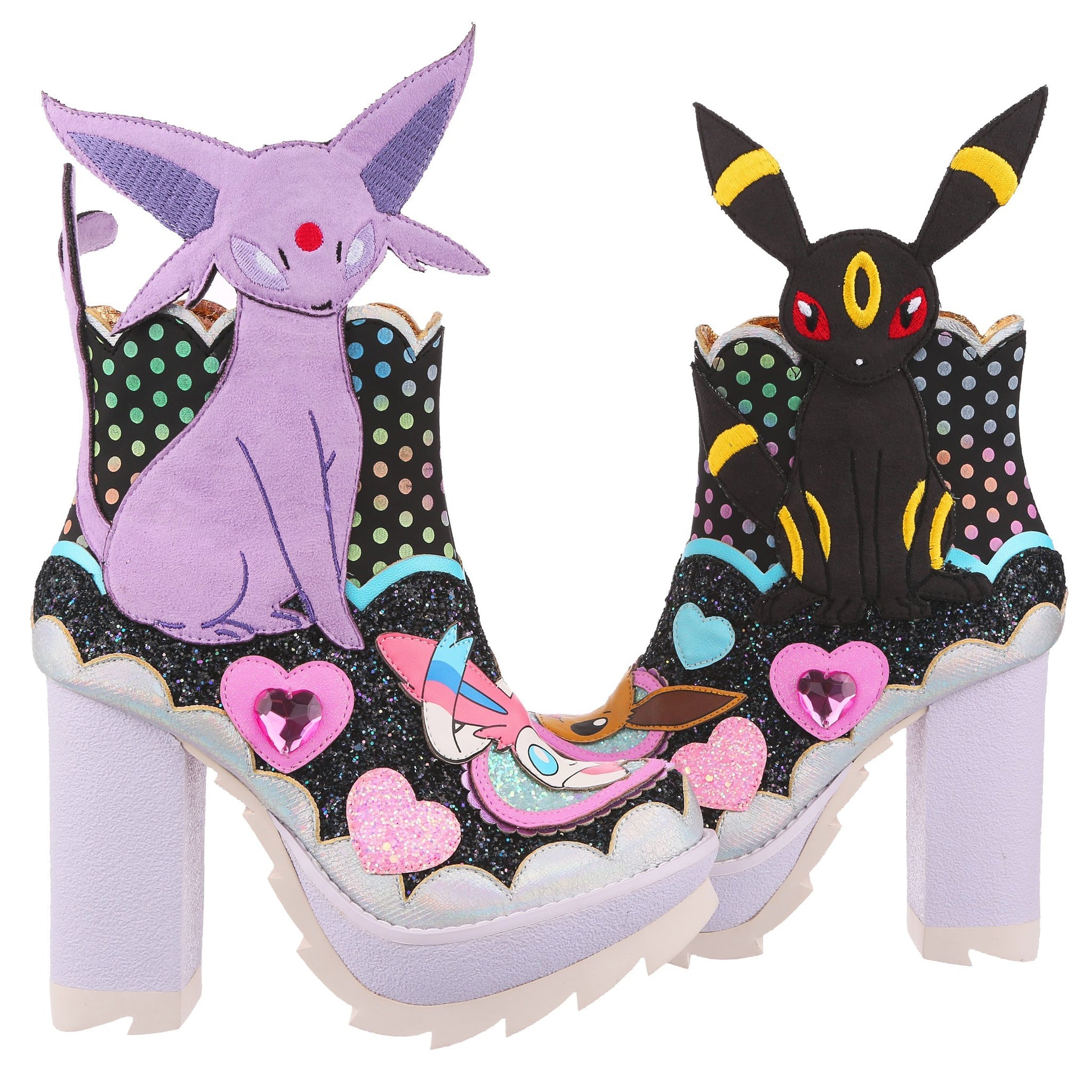 Chunky high heel boots with a scalloped top and pastel rainbow dots on a black fabric is above a black glitter encrusted shoe of the boot. Large applique characters of Espeon and Umbreon sit on the outside ankles, their heads and ears poke above the top of the boot. On the toes, in pink and blue glitter hearts are the faces of Eevee and Sylveon. The boot sits on a chunky lilac platform and high heel.