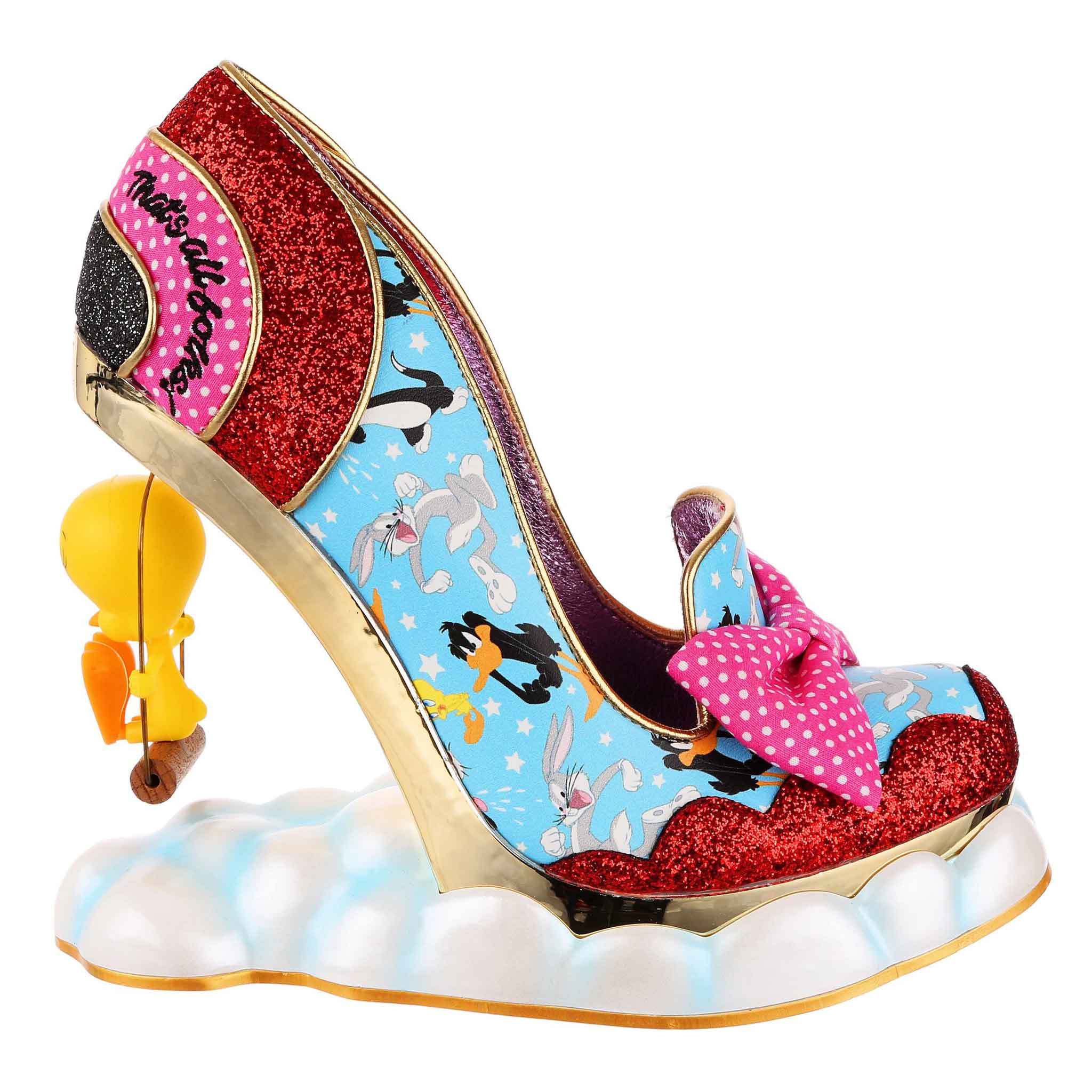 A high heel shoe with blue upper printed with Looney Tunes characters, red glitter toe and heel with a bright pink and white polka dot bow at the front. The concept heel is Tweety Bird sitting on a swing above clouds that are all around the base of the shoe.