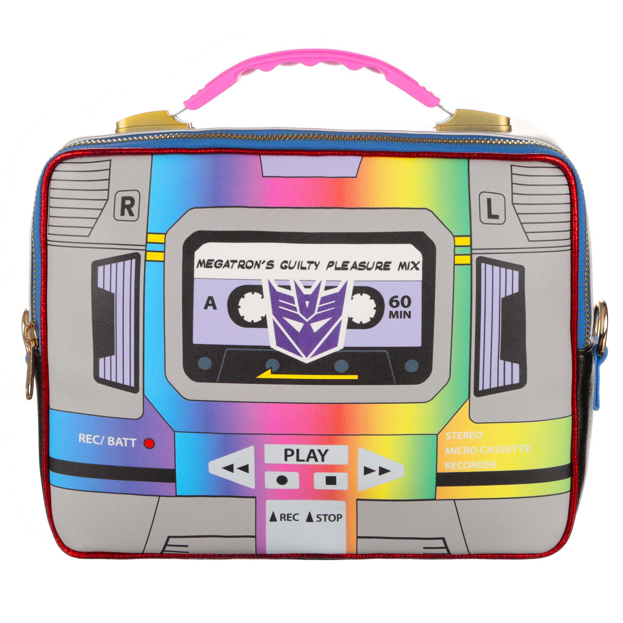 A Transformers-themed rectangular-shaped structured bag with a multicoloured eighties retro cassette player print on the front. A Decepticon logo sits over the cassette tape whilst the cassette label reads ‘Megatron’s Guilty Pleasure Mix.’ A gold and blue zip runs across the top of the shoulder bag whilst a pink and gold handle sit on the top of the handbag.  
